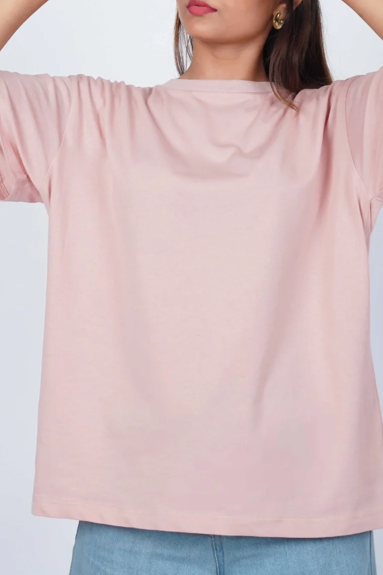 plain-dusty-pink-relaxed-fit-t-shirt-woman-put-on-2